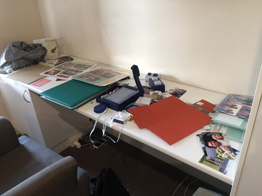 A messy scrapbooking desk