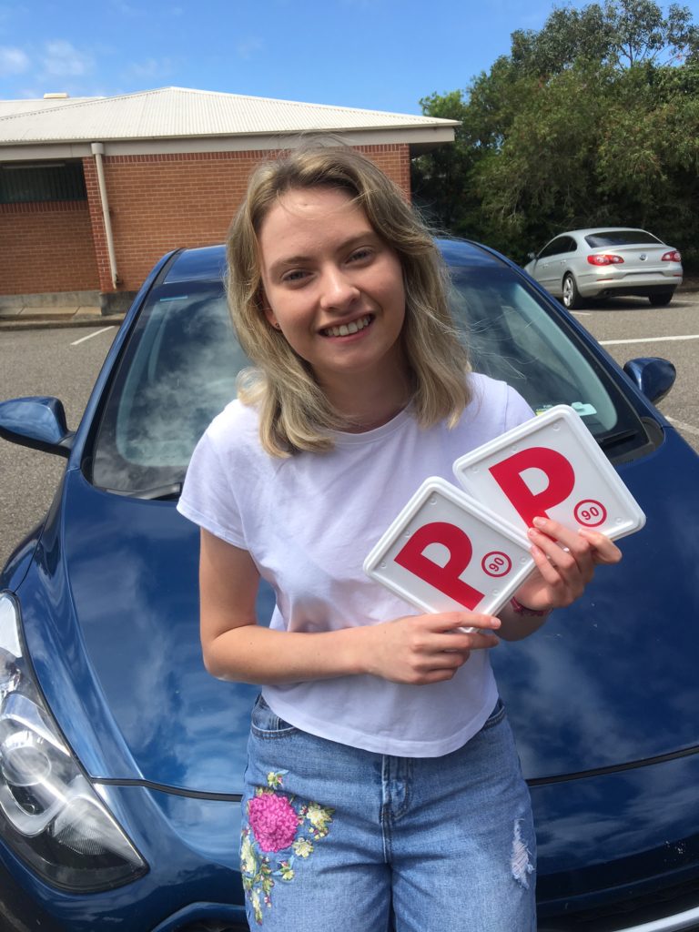 Young driver gets her licence.